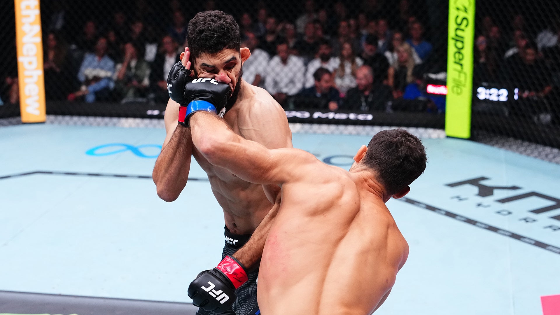 Axel Sola striking Farès Ziam at UFC Paris